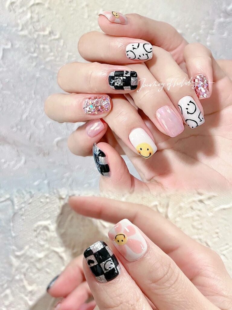 Mẫu nail mặt cười đẹp, dễ thương: Gợi ý hot trend năm 2025 Mau Nail Mat Cuoi Mix Mau La Mat Xinh Xan 768x1024
