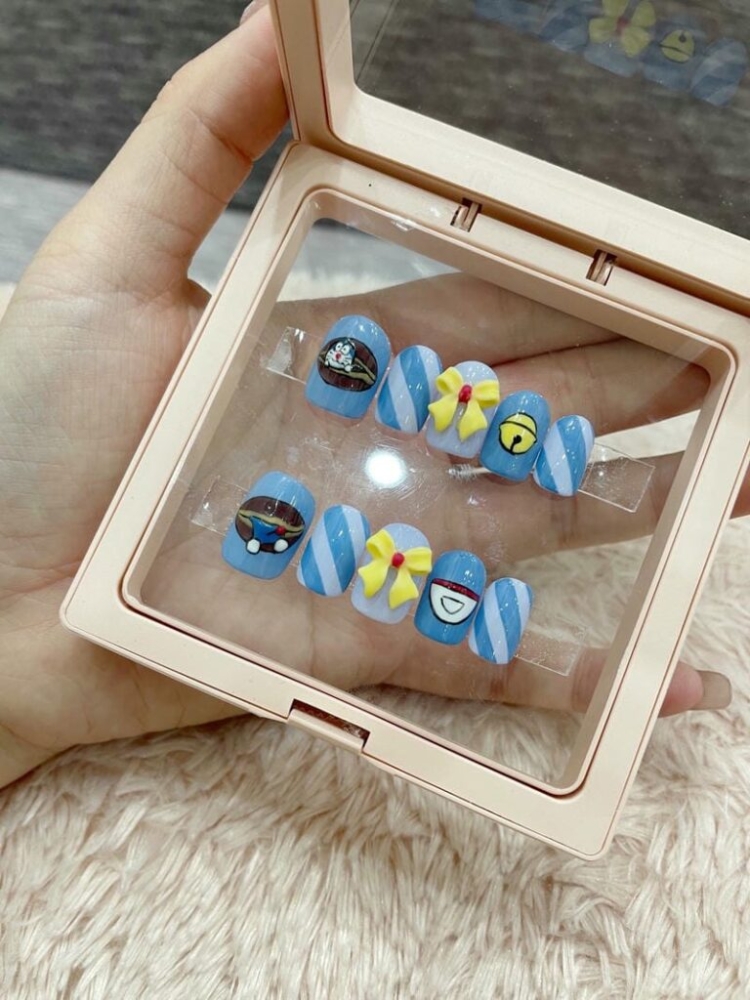 10+ mẫu nail vẽ Doremon đáng yêu cho các nàng mê anime 3 Mau Nail Ve Doraemon Nhe Nhang Dep 768x1024