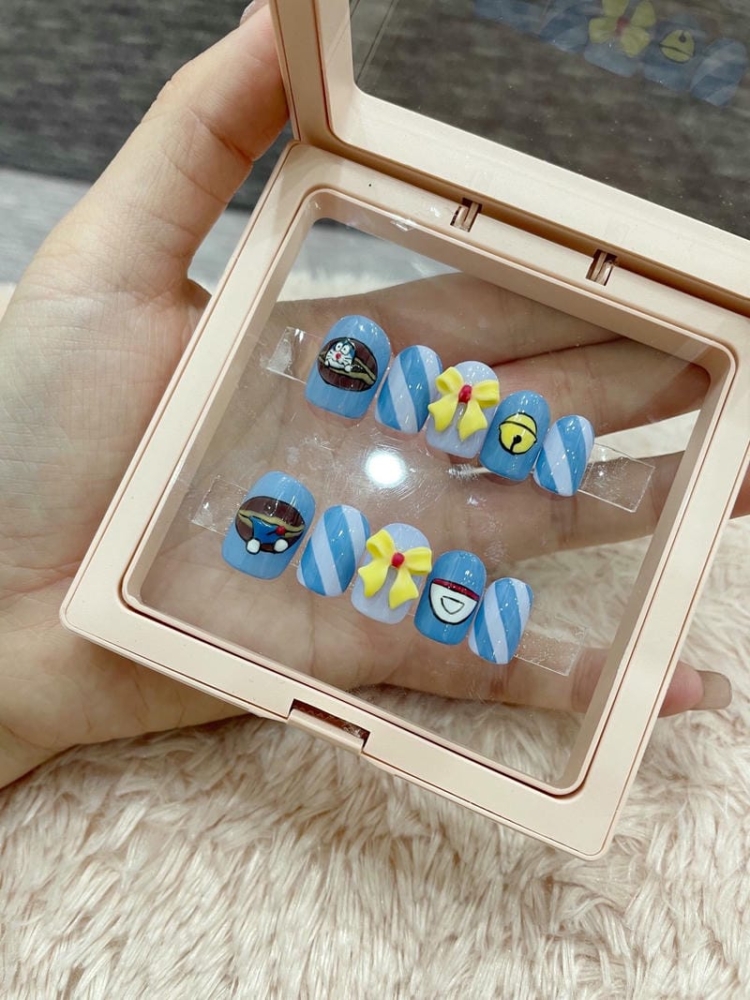 10+ mẫu nail vẽ Doremon đáng yêu cho các nàng mê anime 2 Mau Nail Ve Doraemon Nhe Nhang Dep