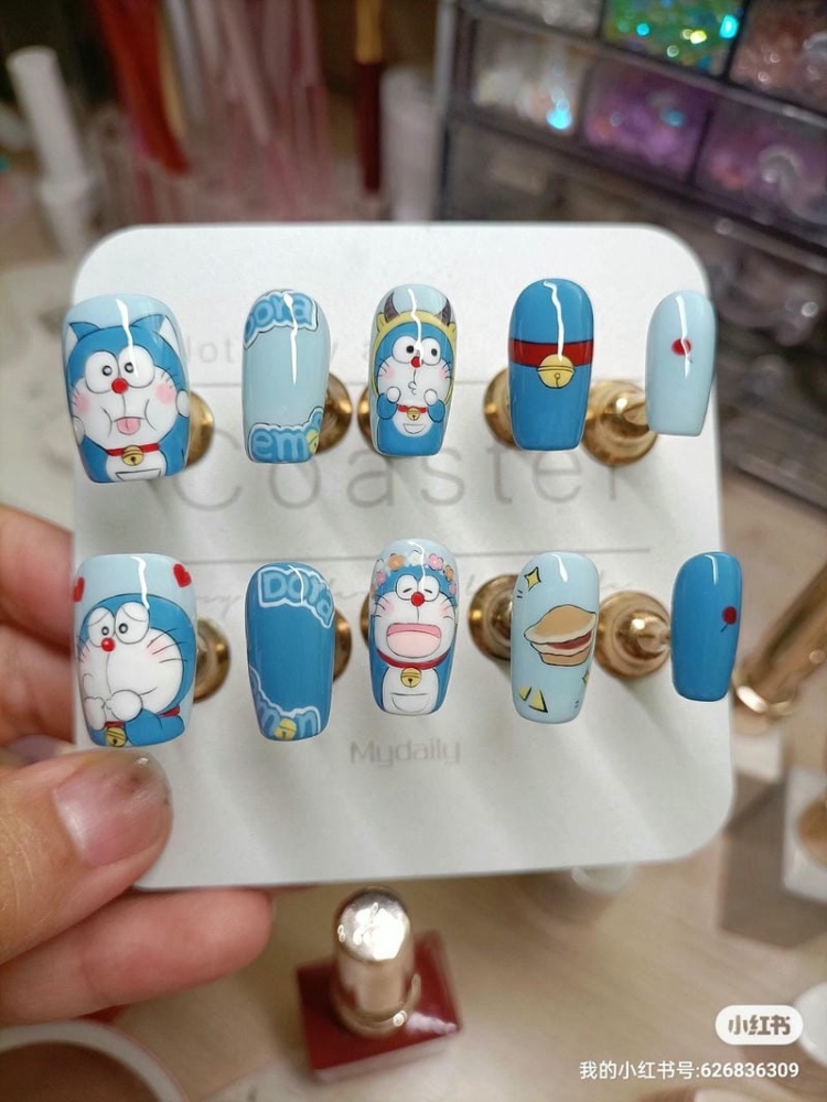 10+ mẫu nail vẽ Doremon đáng yêu cho các nàng mê anime 8 Mau Nail Ve Meo U Doraemon Cute Dang Yeu