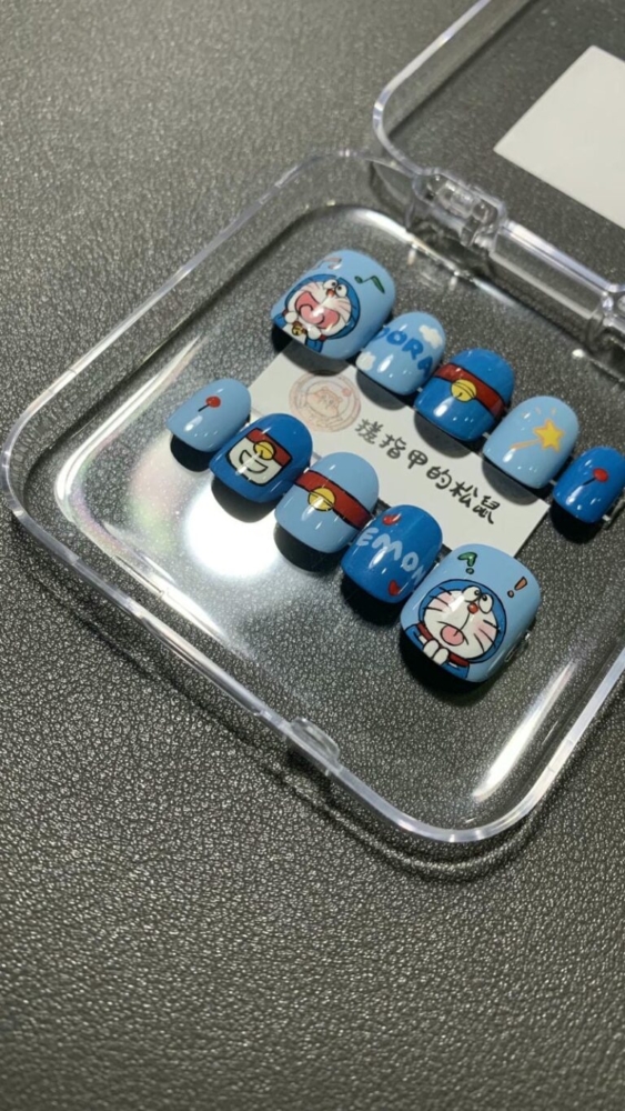 10+ mẫu nail vẽ Doremon đáng yêu cho các nàng mê anime 11 Nail Ve Doraemon Ngo Nghinh Dang Yeu 768x1365