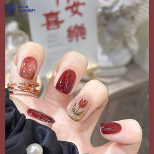 Gợi ý mẫu móng tay sơn thạch màu đỏ mận kết hợp hoa