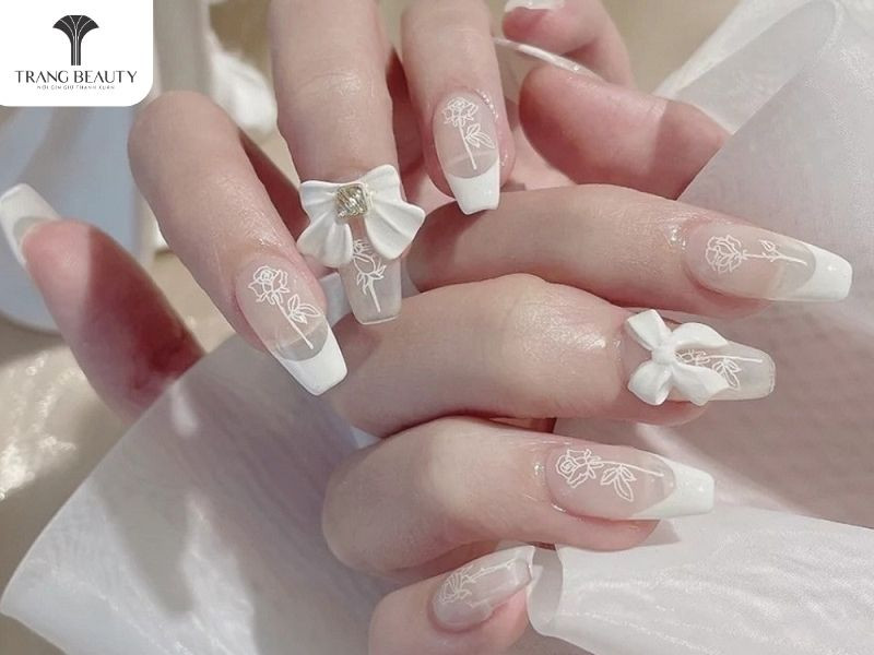 Kiểu móng tay nơ đính nơ kết hợp họa tiết vẽ tinh xảo