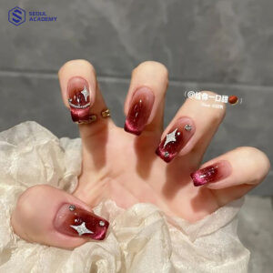 Kiểu móng tay sơn màu đỏ mận với hiệu ứng ombre cuốn hút