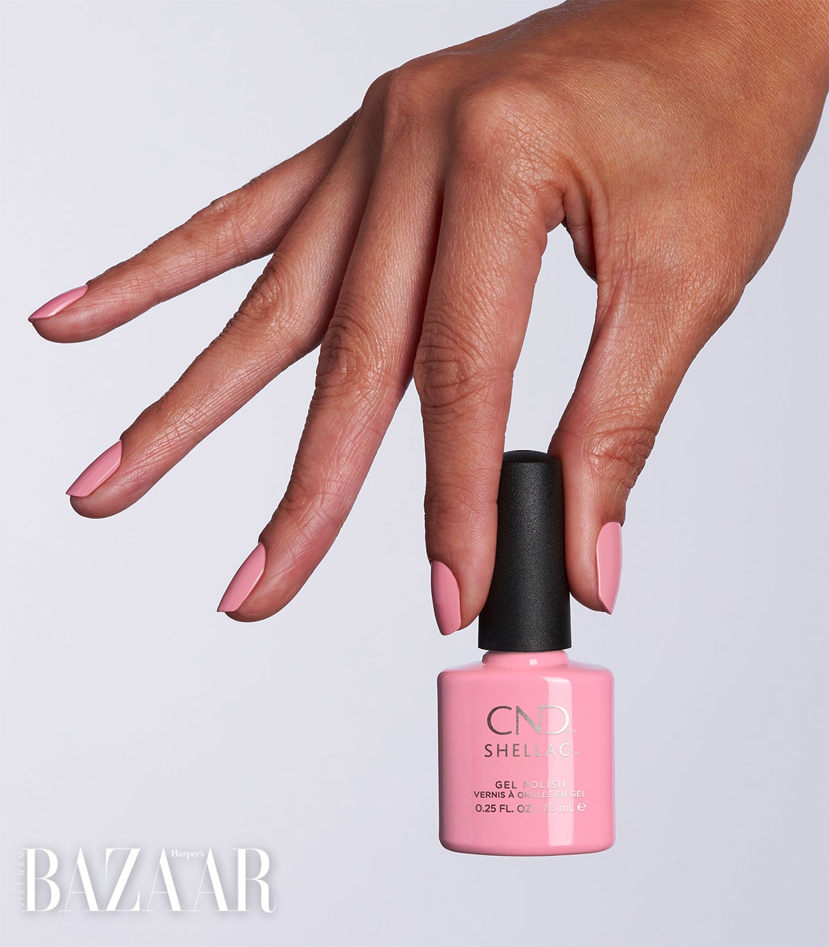 Lọ sơn móng tay gel CND Shellac Pacific Rose, một thương hiệu uy tín giảm thiểu tác hại của sơn móng tay gel.