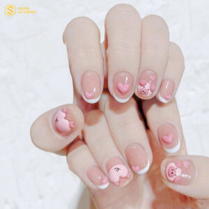 Mẫu móng tay đẹp cho bé gái với họa tiết heo hồng dễ thương
