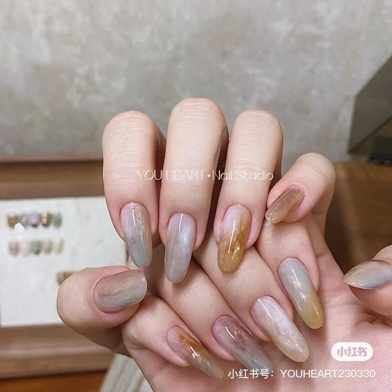 Mẫu móng tay đẹp dài họa tiết vân đá sang trọng