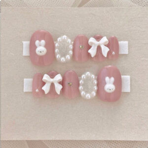 Mẫu móng tay trẻ em đẹp với bộ nail hồng nơ trắng hợp với các bé gái