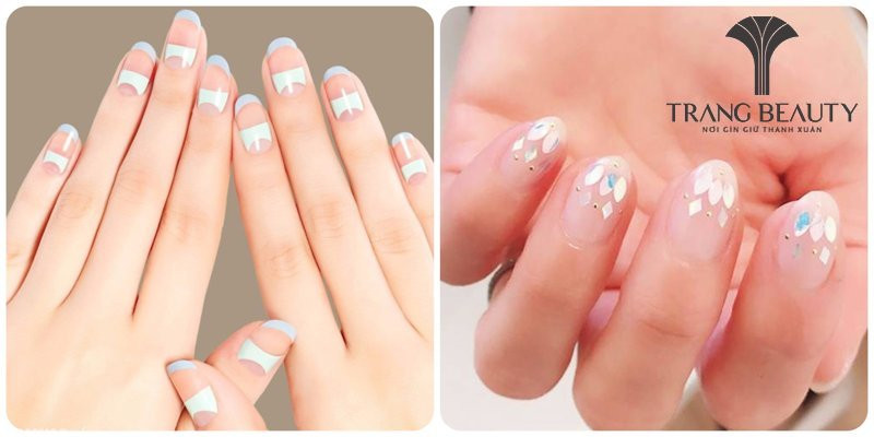 Mẫu sơn đầu móng tay trắng với họa tiết đường cong ở nửa móng, rất trang nhã