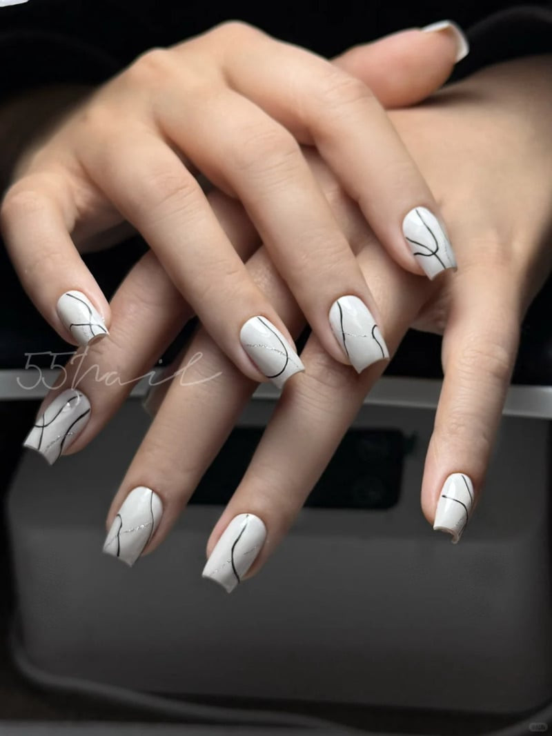 Mẫu vẽ móng tay đơn giản vân đá màu xanh ngọc kết hợp màu pastel