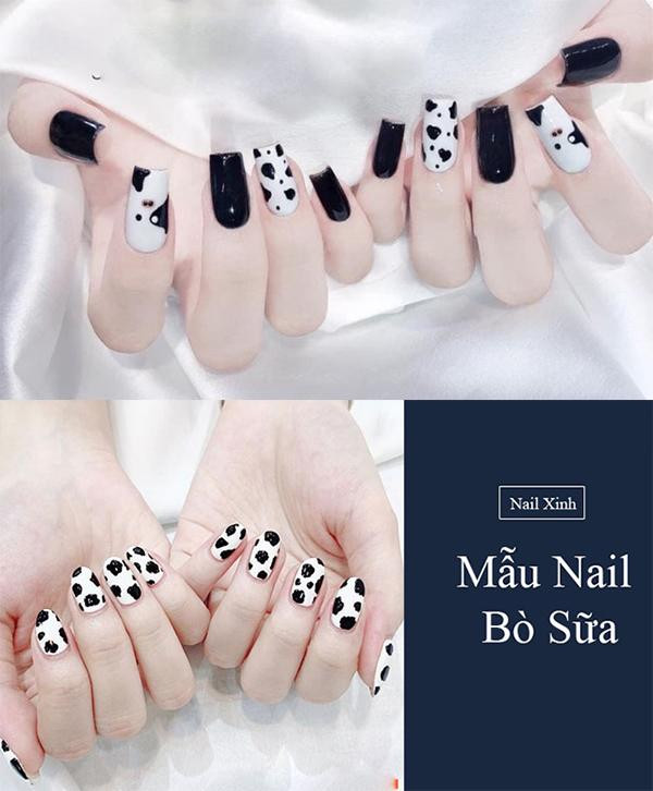 Móng tay bò sữa đen trắng với những đốm màu đen trên nền trắng cổ điển