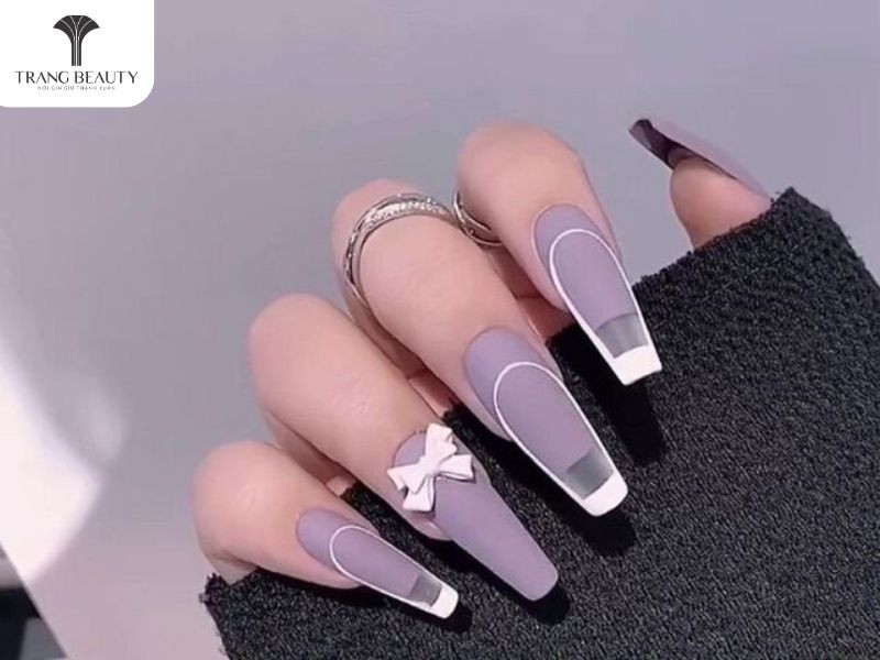 móng tay đính nơ cho học sinh tông tím nhẹ nhàng