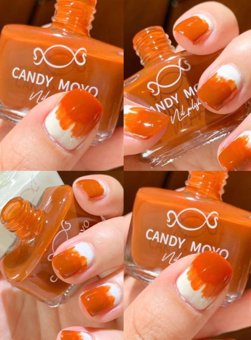 Móng tay màu cam gạch cho da ngăm