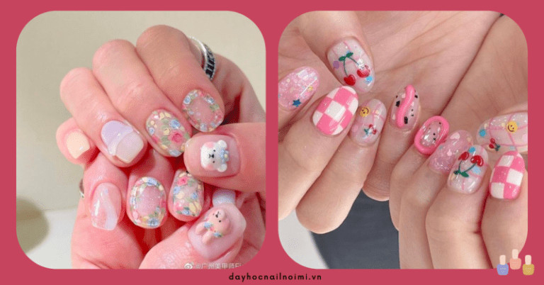 Móng tay màu hồng nhạt với charm nổi và họa tiết kẹo ngọt