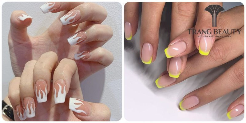Nail đầu móng tay trắng kết hợp đường viền màu đen sắc sảo, tạo điểm nhấn cá tính
