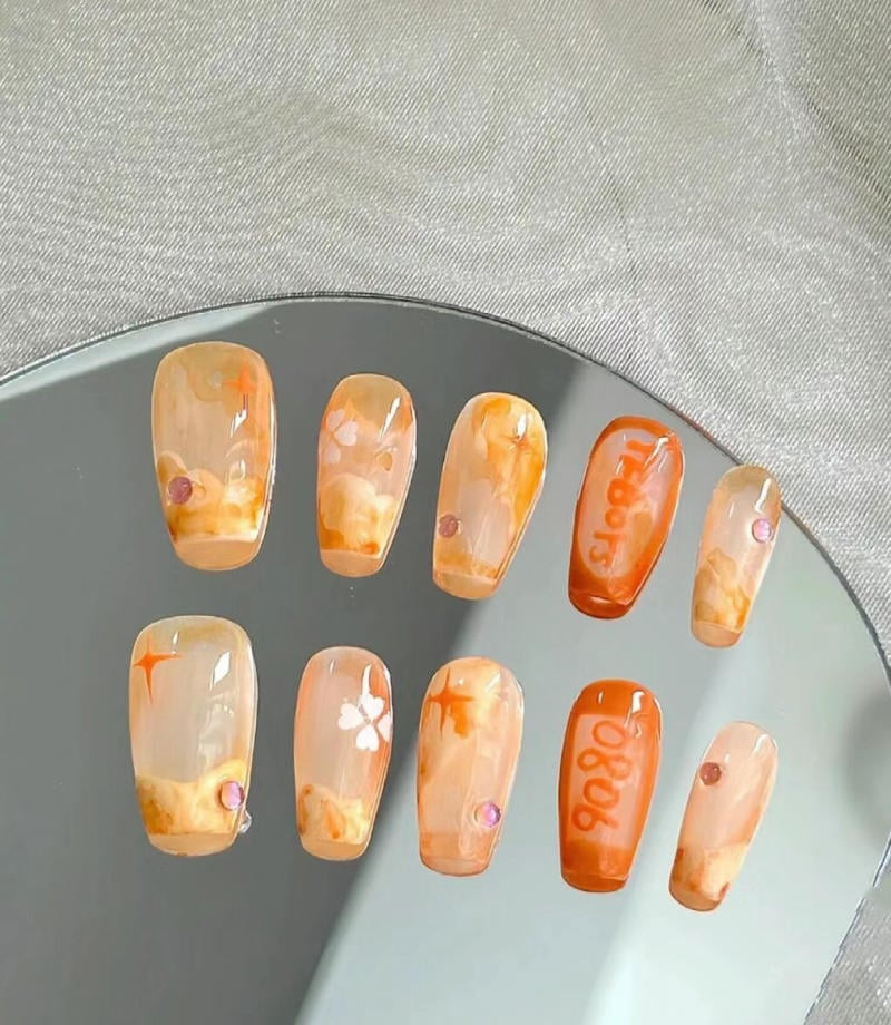 Nail màu cam thạch trong trẻo