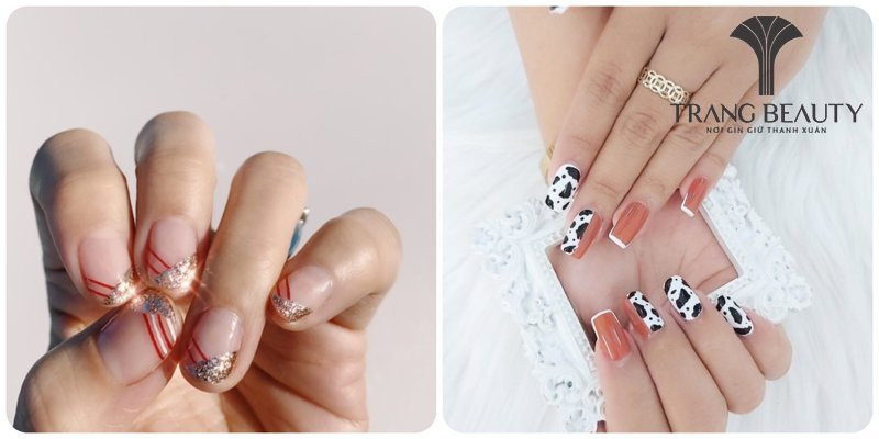Sơn đầu móng tay trắng kết hợp họa tiết chấm bi ở nửa móng, mang vẻ đáng yêu
