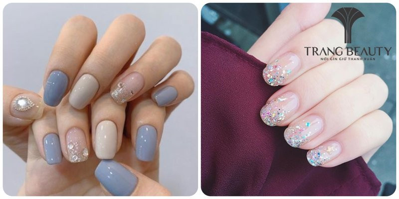 Sơn đầu móng tay trắng kiểu French đính kim tuyến bạc lấp lánh, phù hợp cho tiệc tối